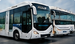 An airport parking shuttle bus